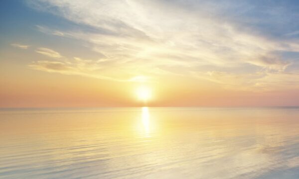 Pastel sunset over the ocean in a cloudy sky Esimese õppeaasta ettemaks